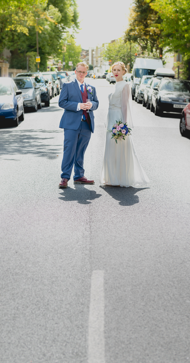 walking into the distance at a city wedding by Wilson and Lewis Photography