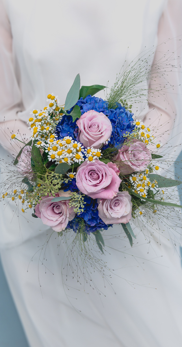 city wedding Dress and bouquet by Wilson and Lewis Photography