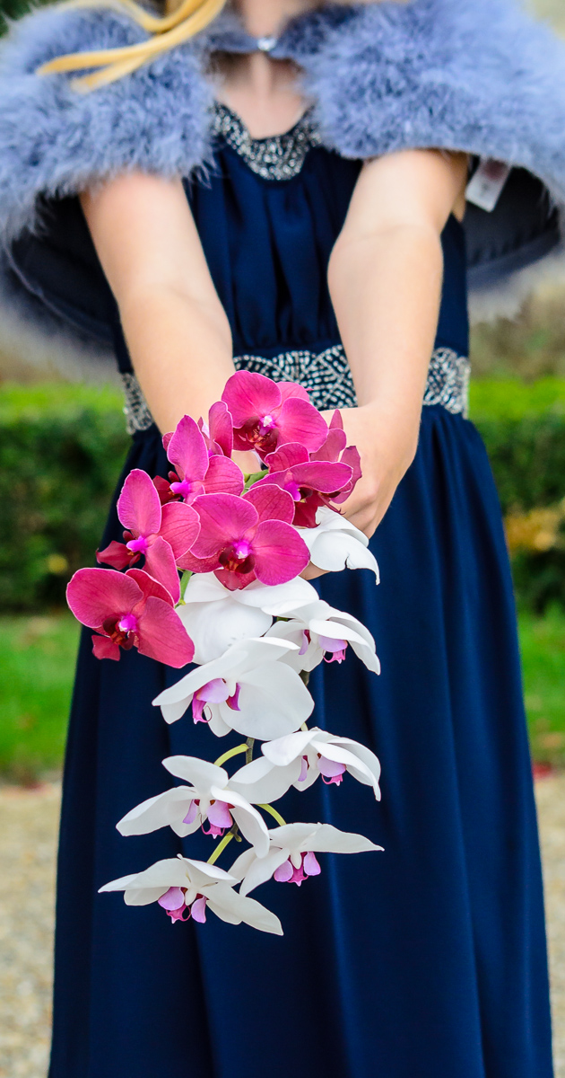 Kathryn's daughter and her countruside wedding bouquet by Wilson and Lewis Photography
