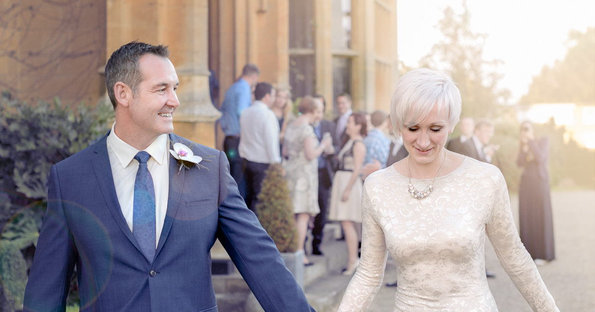 sunshine on the bride and groom at countryside wedding by Wilson and Lewis Photography