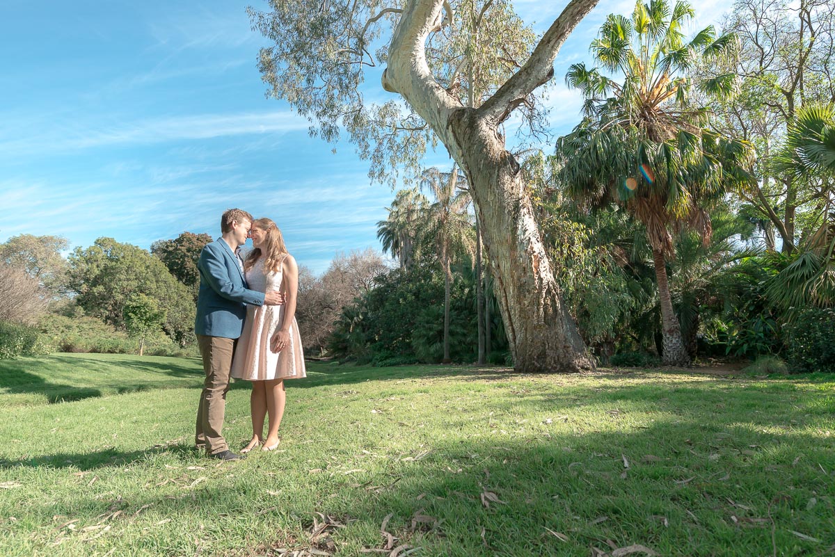 couple cuddling in Australian landscape