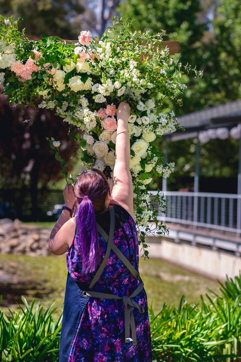 bella in bloom creating a wedding arbour