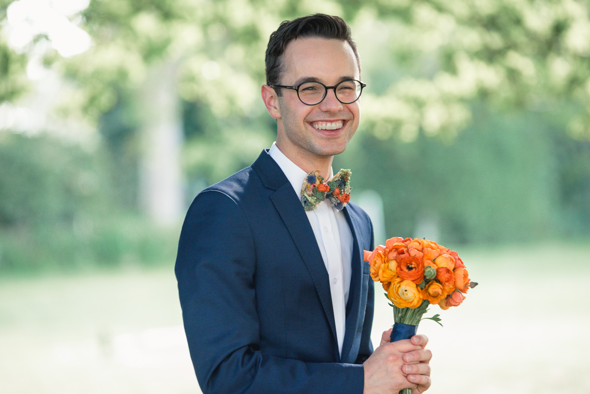 groom with wedding flowers at collingrove homestead
