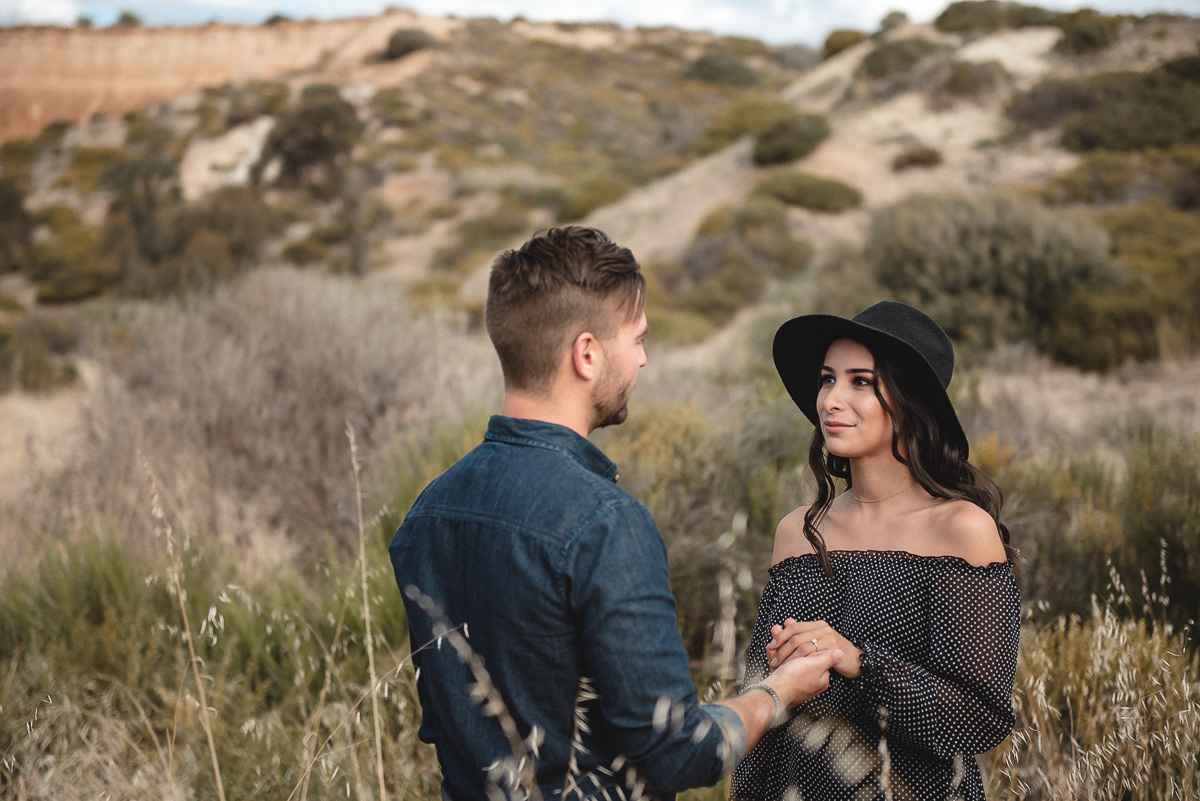 holding hands in hallett cove grass