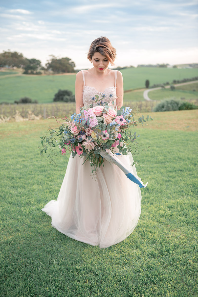 bridal portrait with huge bouquet at same sex wedding