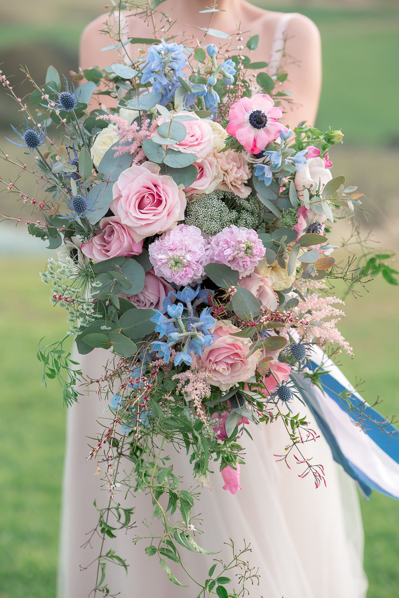 huge bridal bouquet at same sex wedding