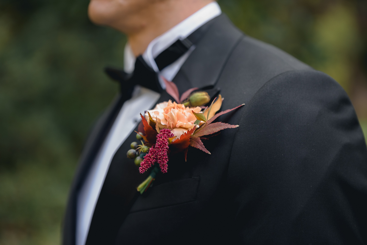 groom buttonhole at autumn wedding