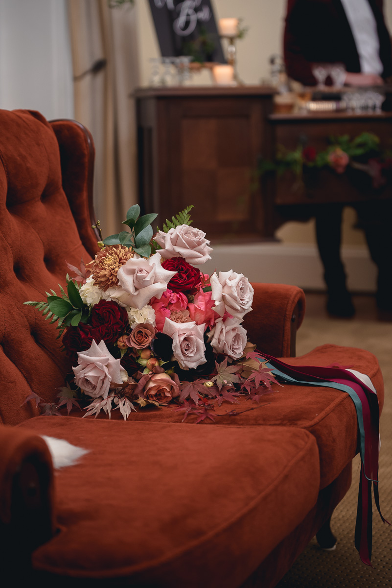 autumn wedding bouquet on vintage lounge