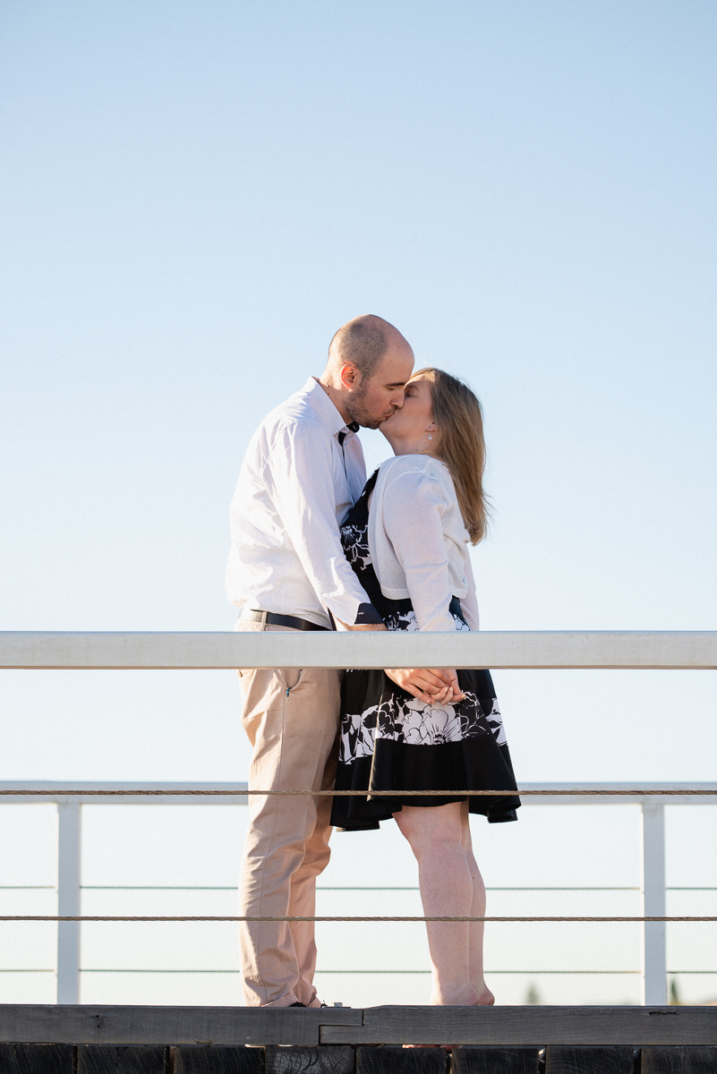 grange beach jetty engagement kiss