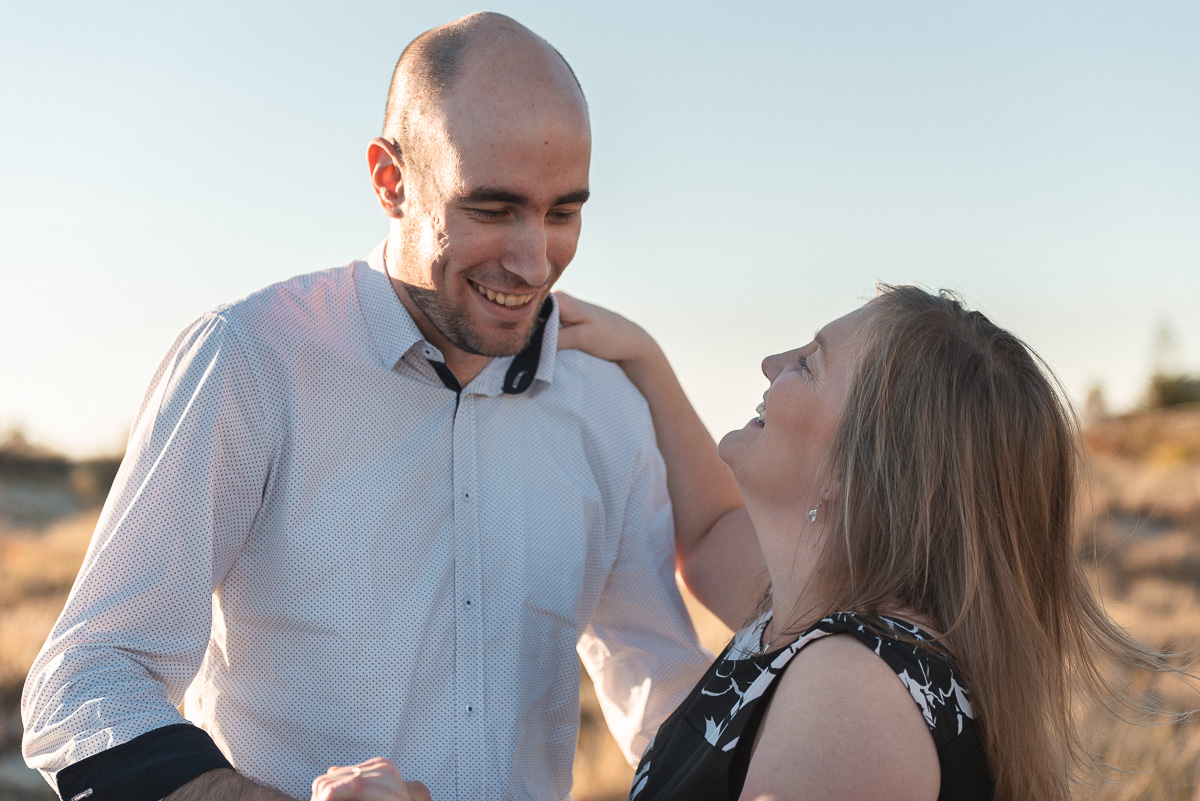 couple engaged at grange beach in Adelaide