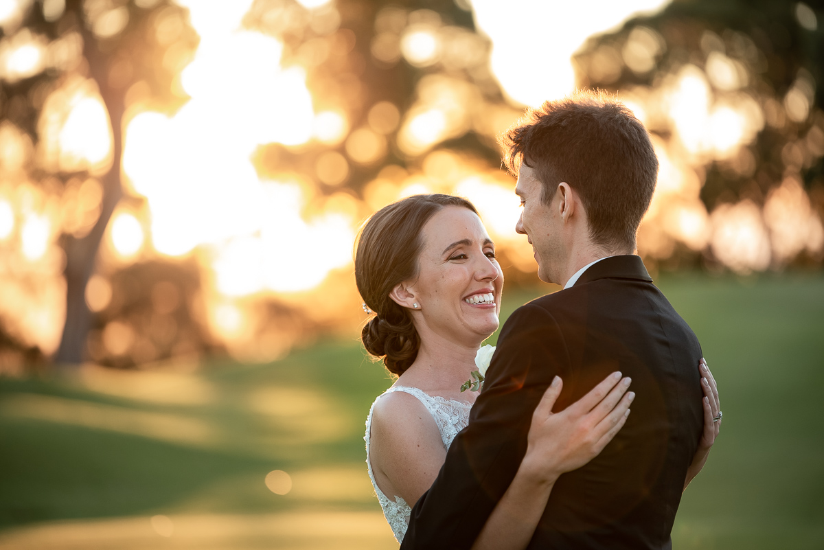 wedding photographer for sunset with newlywed couple