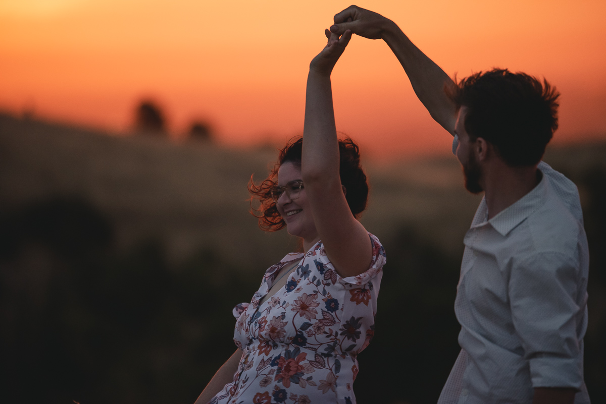 couple dancing in sunset photo
