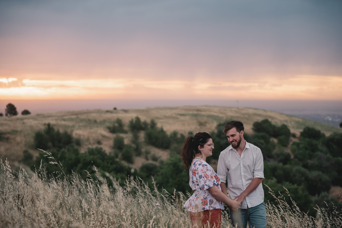 rain and sunset photography with happy couple