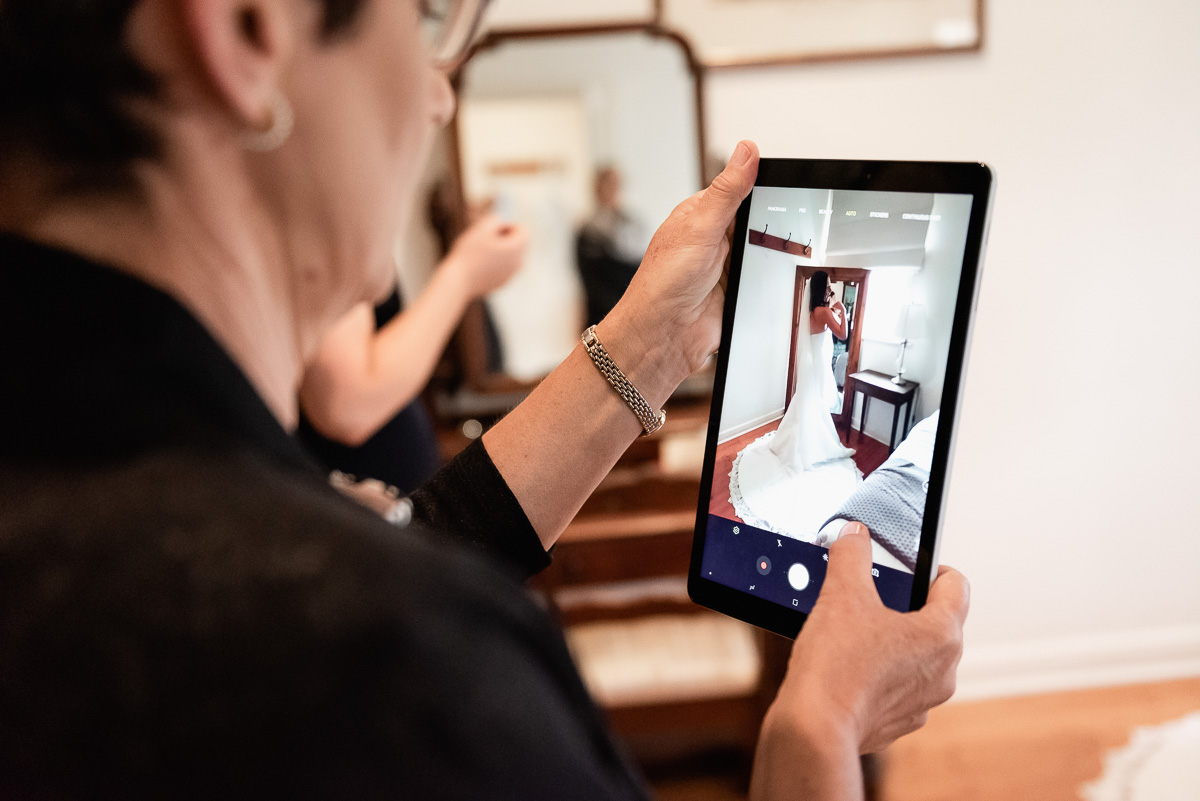 mum with i-pad at unplugged wedding