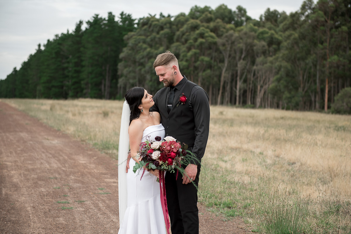 couple enjoying their portrait session after micro wedding in Adelaide