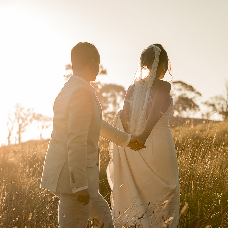 Couple walking into the sun by Adelaide elopement photographer wilson and Lewis photography