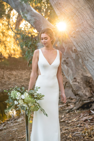 wedding sunset photo adelaide - Bride looking at lake in McLaren Vale - dress Lotus by Theia Couture, courtesy of The Bride Lab