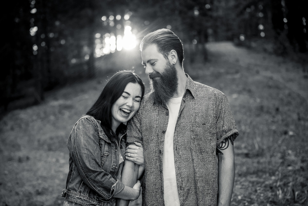 laughing couple in black and white