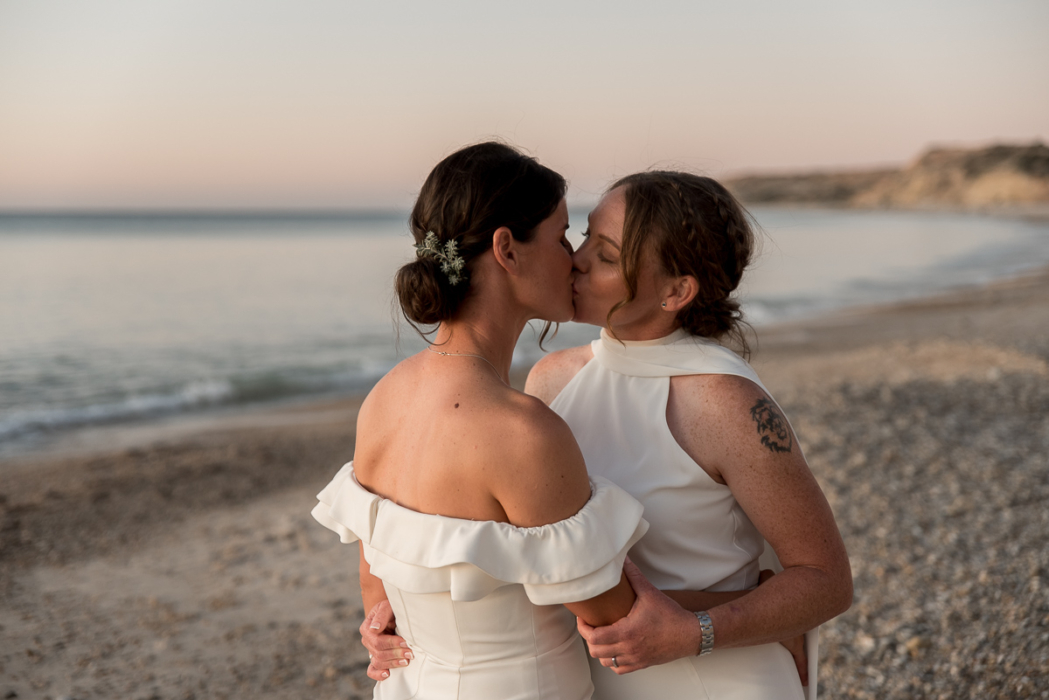 two brides kiss, same sex wedding by Adelaide Wedding Photographers Wilson & Lewis Photography