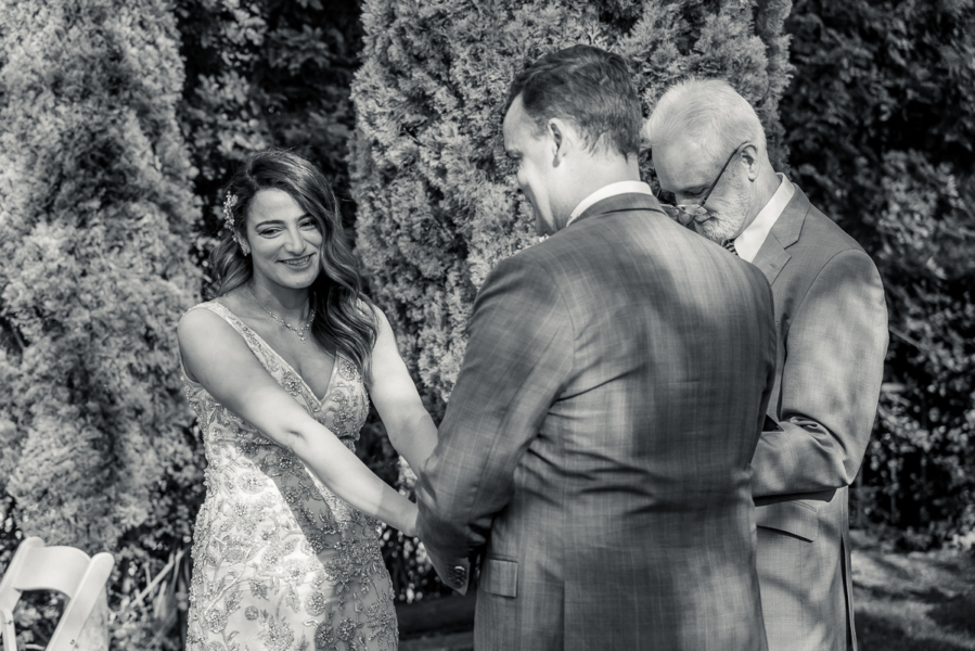 bride laughs during wedding ceremony by Adelaide elopement photographers Wilson and Lewis Photography