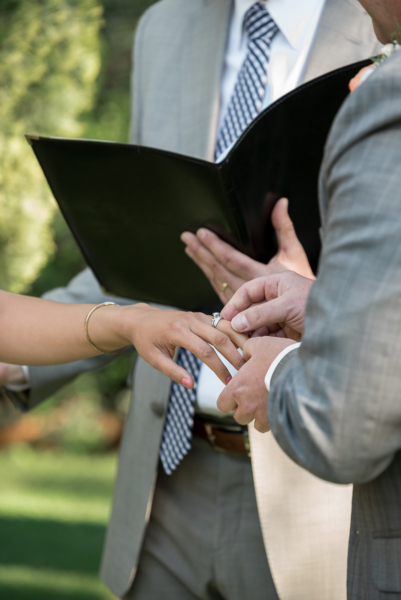 Exchanging the wedding rings by Adelaide elopement photographers Wilson and Lewis Photography