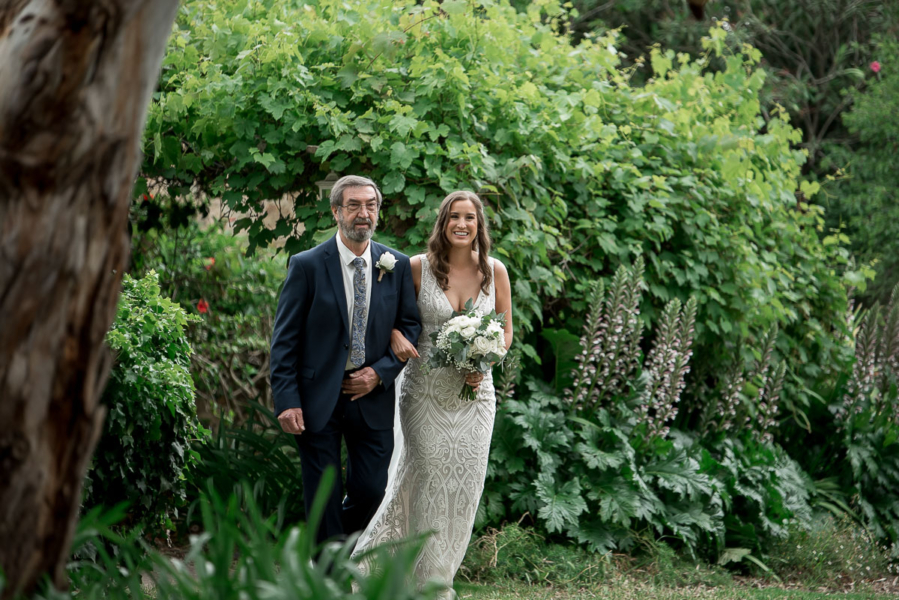 Bride walking up the aisle with her father
